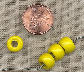 50 VINTAGE GLASS 10x7mm. YELLOW TIRE BEADS