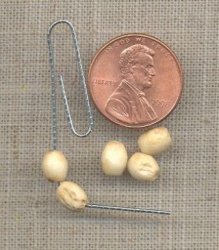 80 VINTAGE GENUINE BONE 7x5mm. OVAL IVORY BROWN BEADS