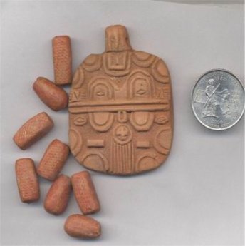 9 VINTAGE ORGANGE CLAY TRIBAL FACE PENDANT & EXTRA BEADS