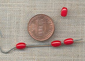 100 VINTAGE GLASS 7x5mm CHERRY REDS OVAL BEADS