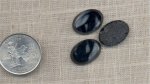 4 VINTAGE JET MARBLE 18X13mm. OVAL GLASS CABOCHONS