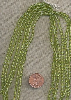 50 VINTAGE GLASS OLIVINE FACETED BICONE 4mm. BEADS